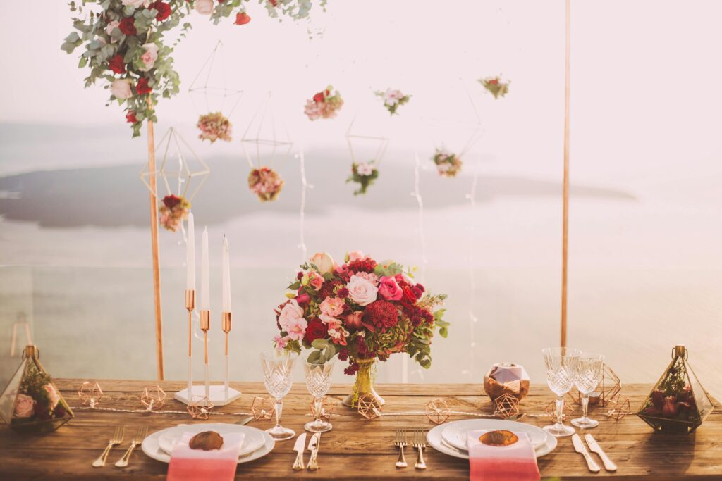 pexels-photo-1045541-1045541 Pink and Red Roses Centerpiece Near Silverwares